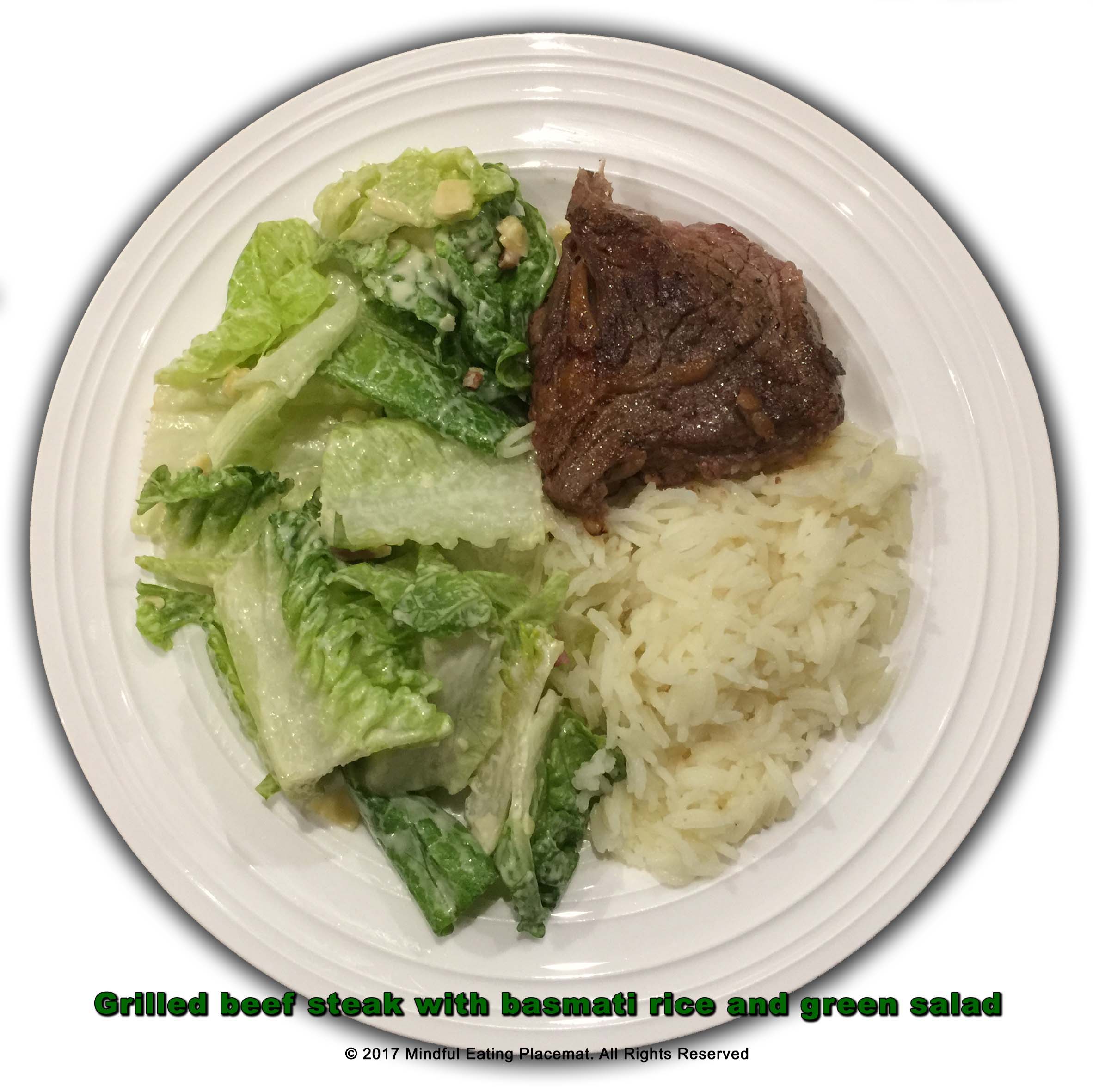 Beef steak with basmati rice and green salad