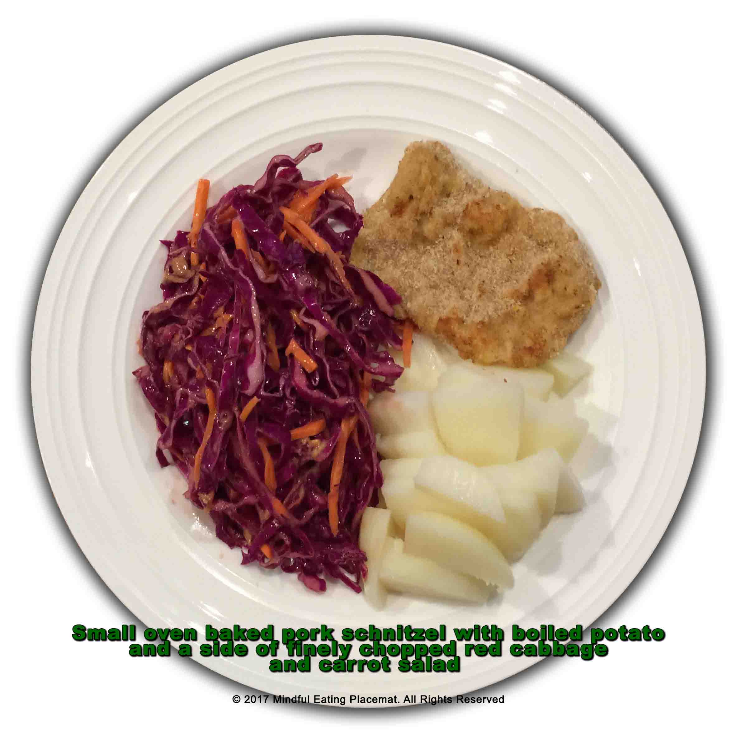 Baked pork schnitzel with potato and red cabbage salad 