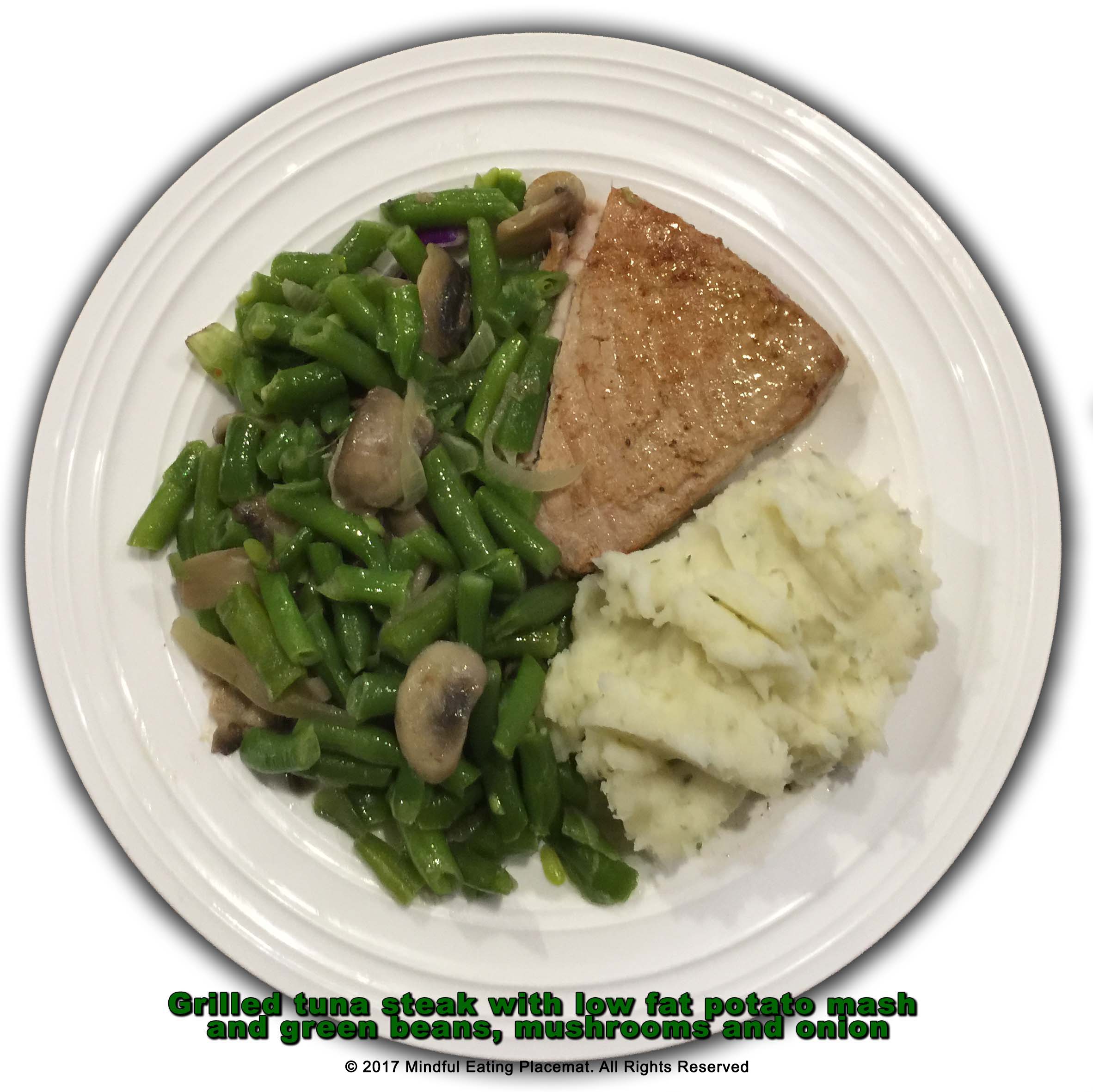 Tuna steak with potato mash and green beans and mushrooms