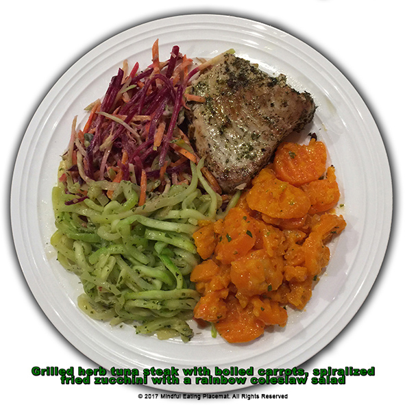 Tuna steak with boiled carrots, zucchini noodles and small salad