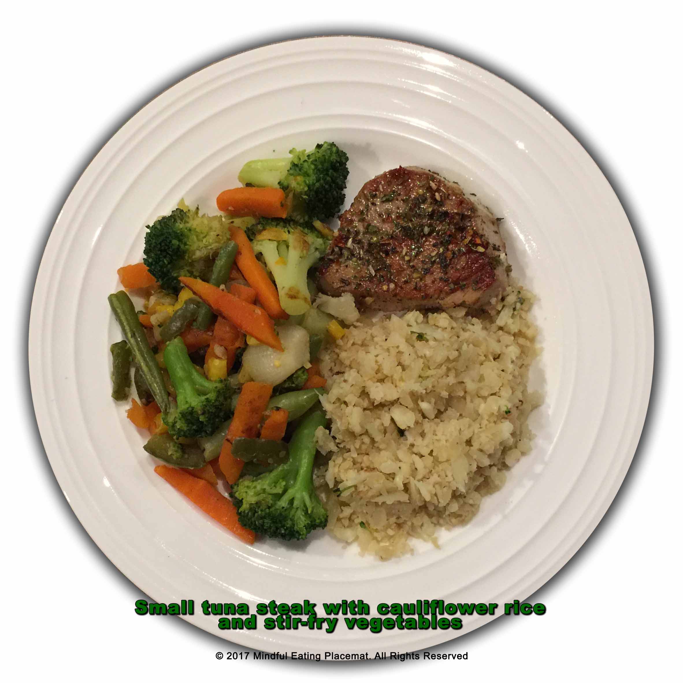 Small tuna steak with cauliflower rice and stir-fry vegetables