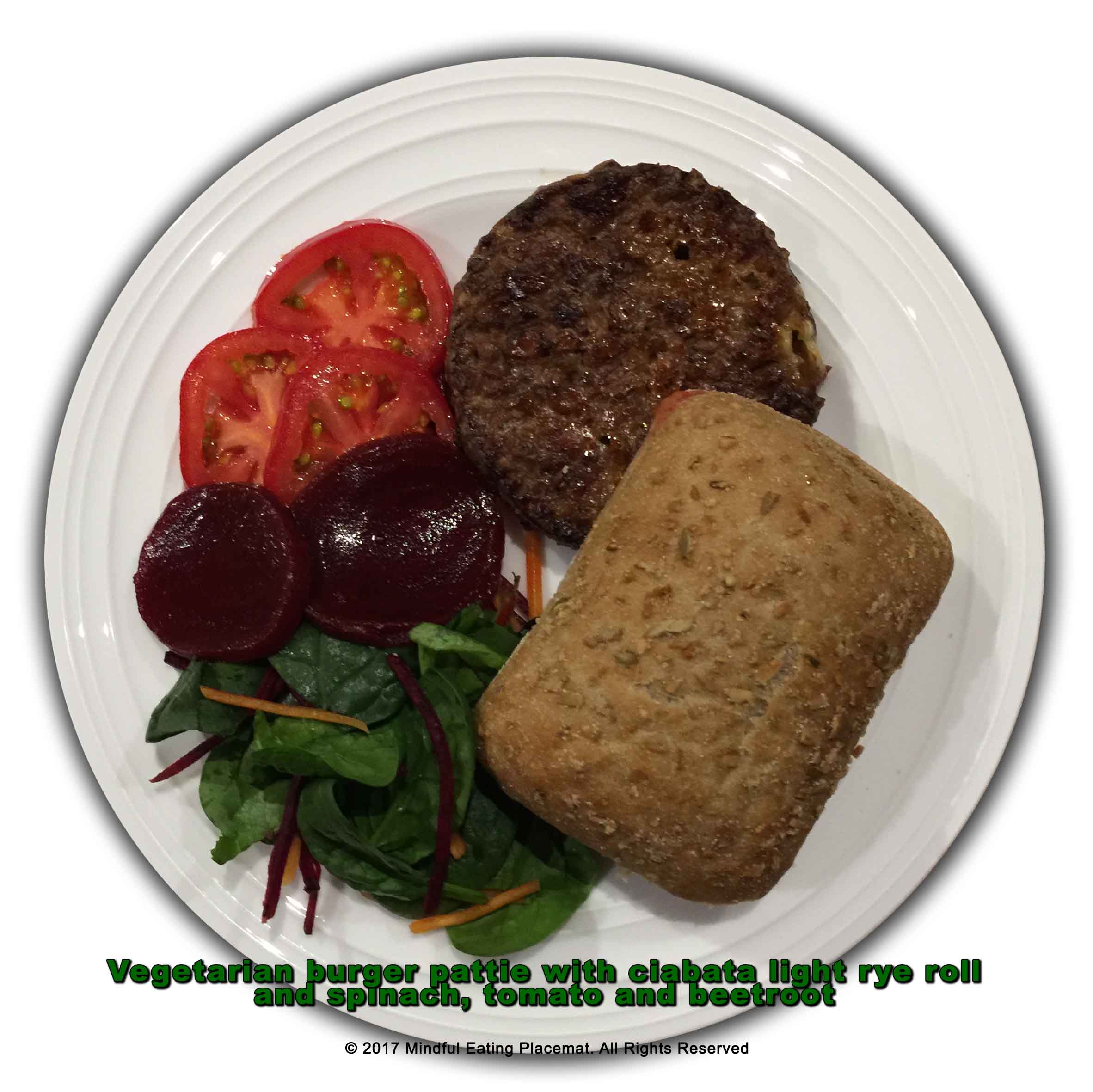 Vegetarian burger with ciabatta roll and spinach, tomato and beetroot