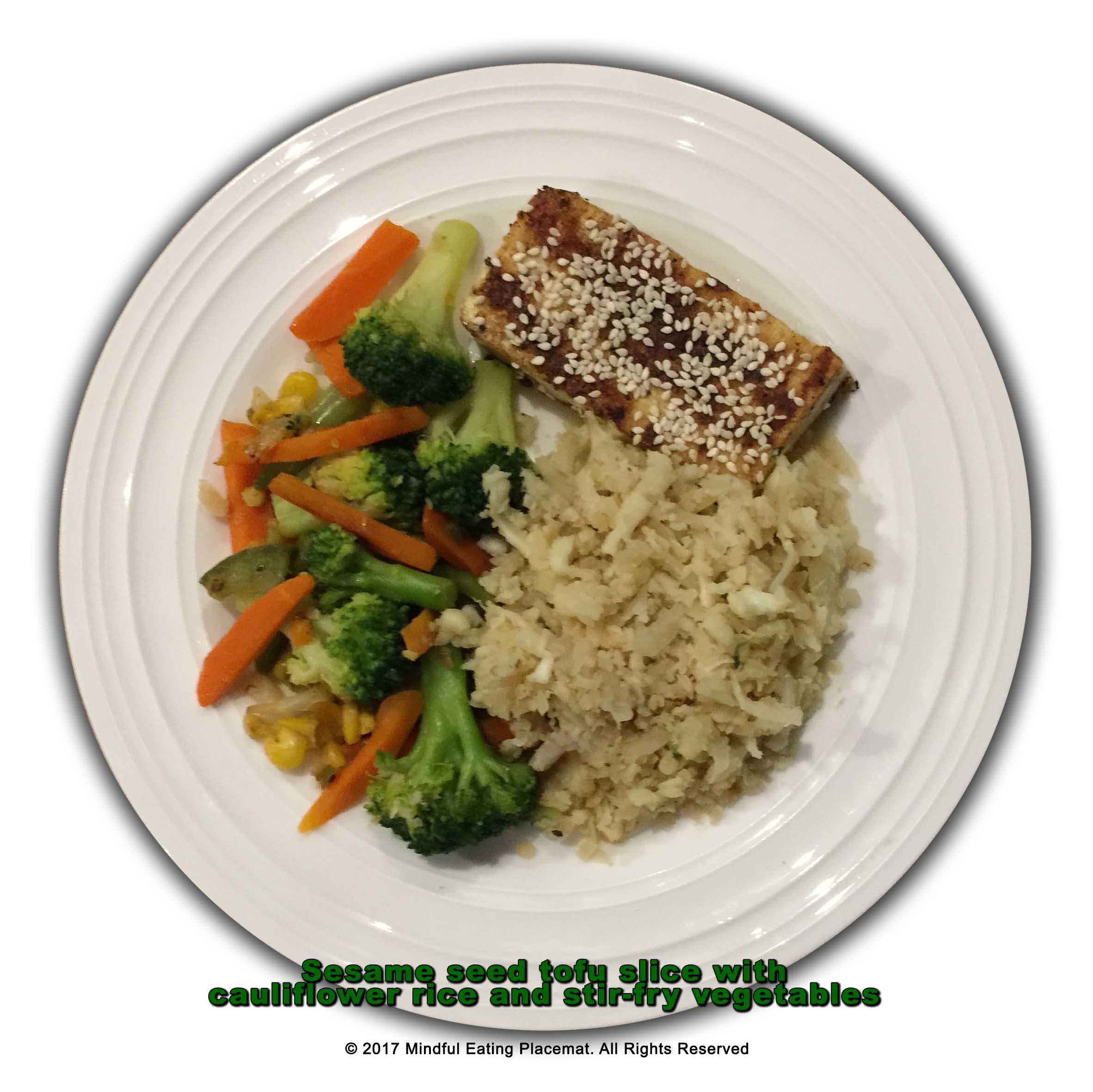 Sesame seed tofu slice with cauliflower rice and stir-fry vegetables
