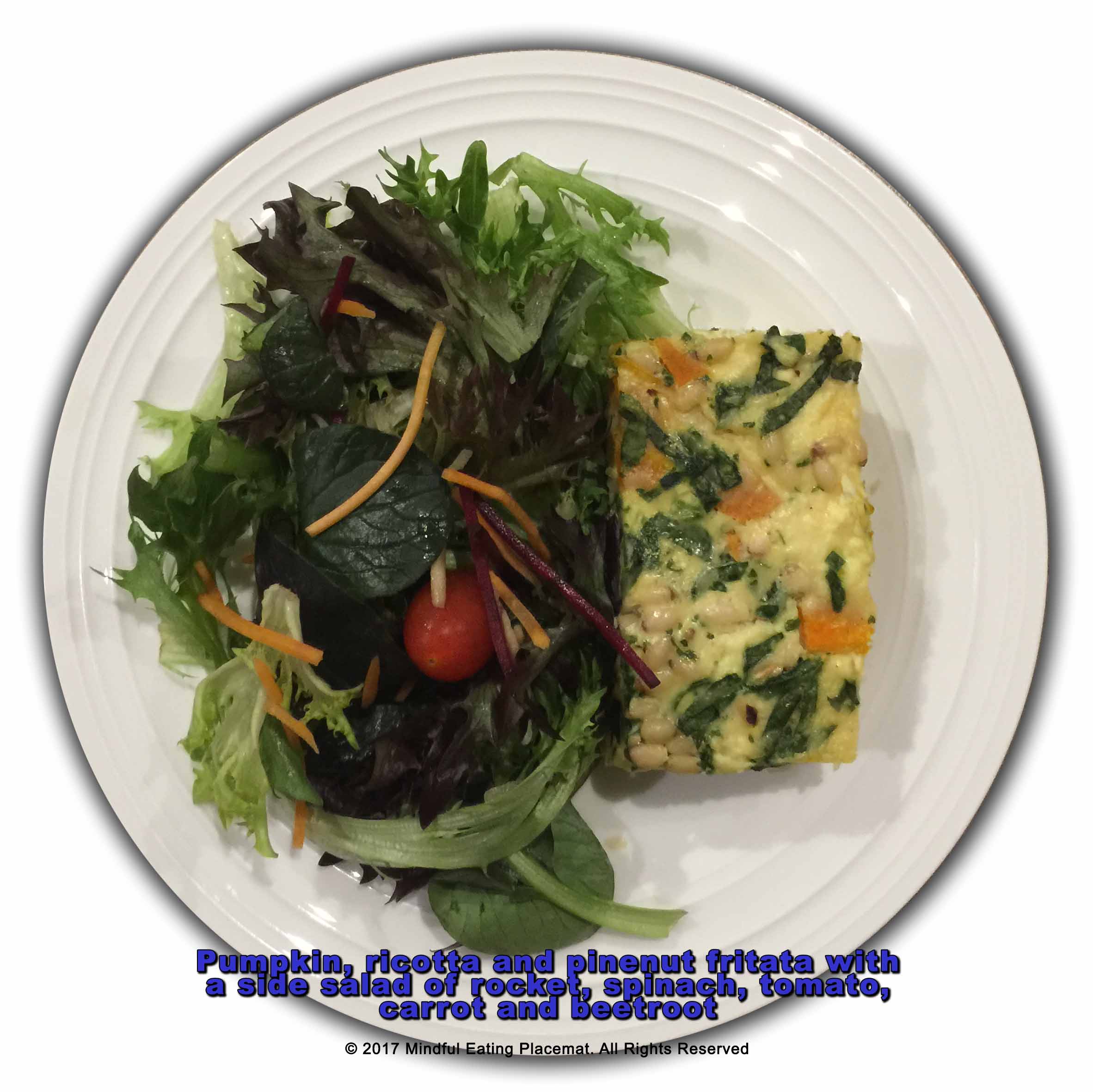 Pumpkin, ricotta and pinenut fritata with a side salad of rocket, spinach, tomato, carrot and beetroot