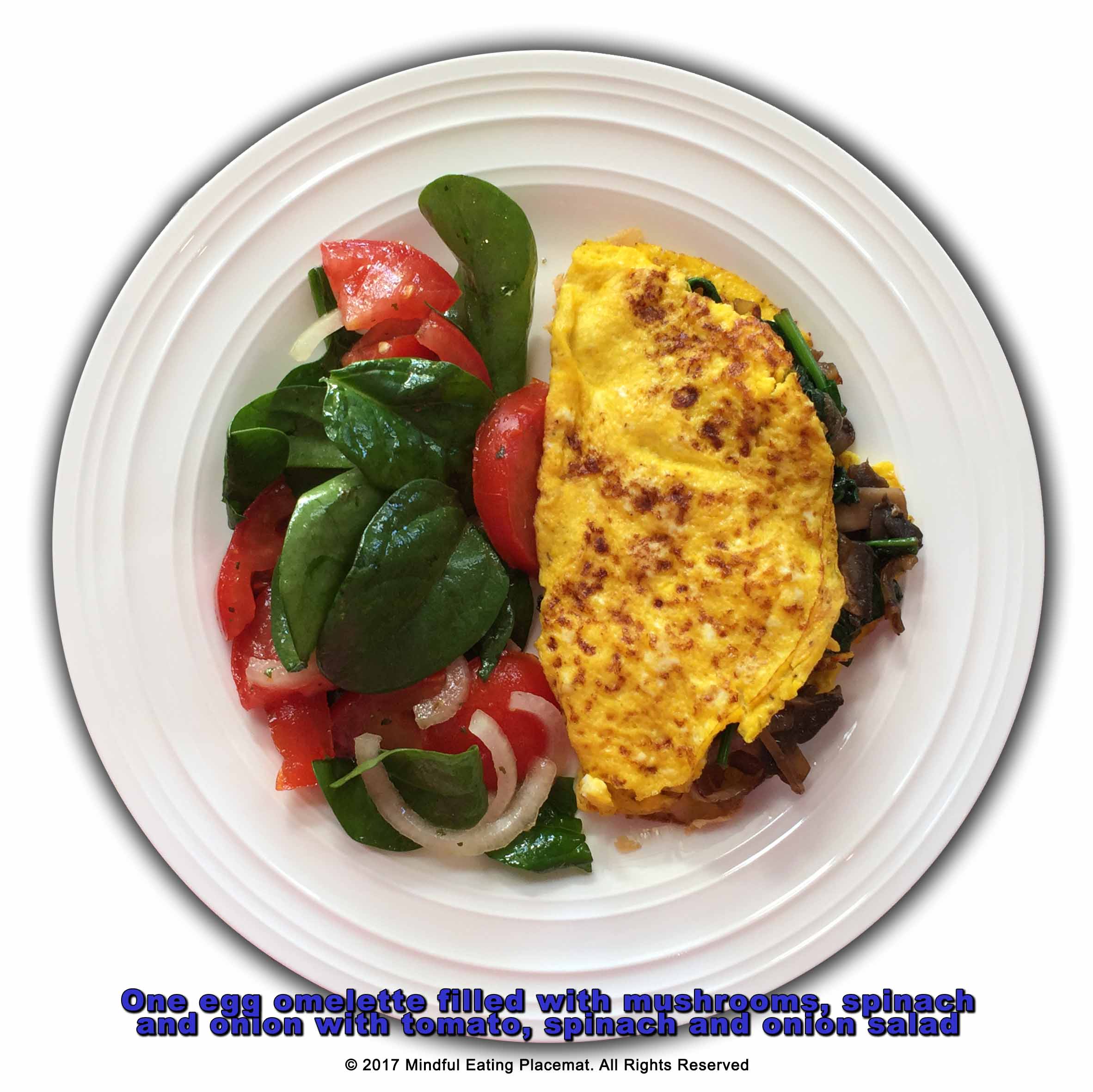 One egg omlette filled with mushrooms, spinach and onion with a tomato, spinach and olive salad