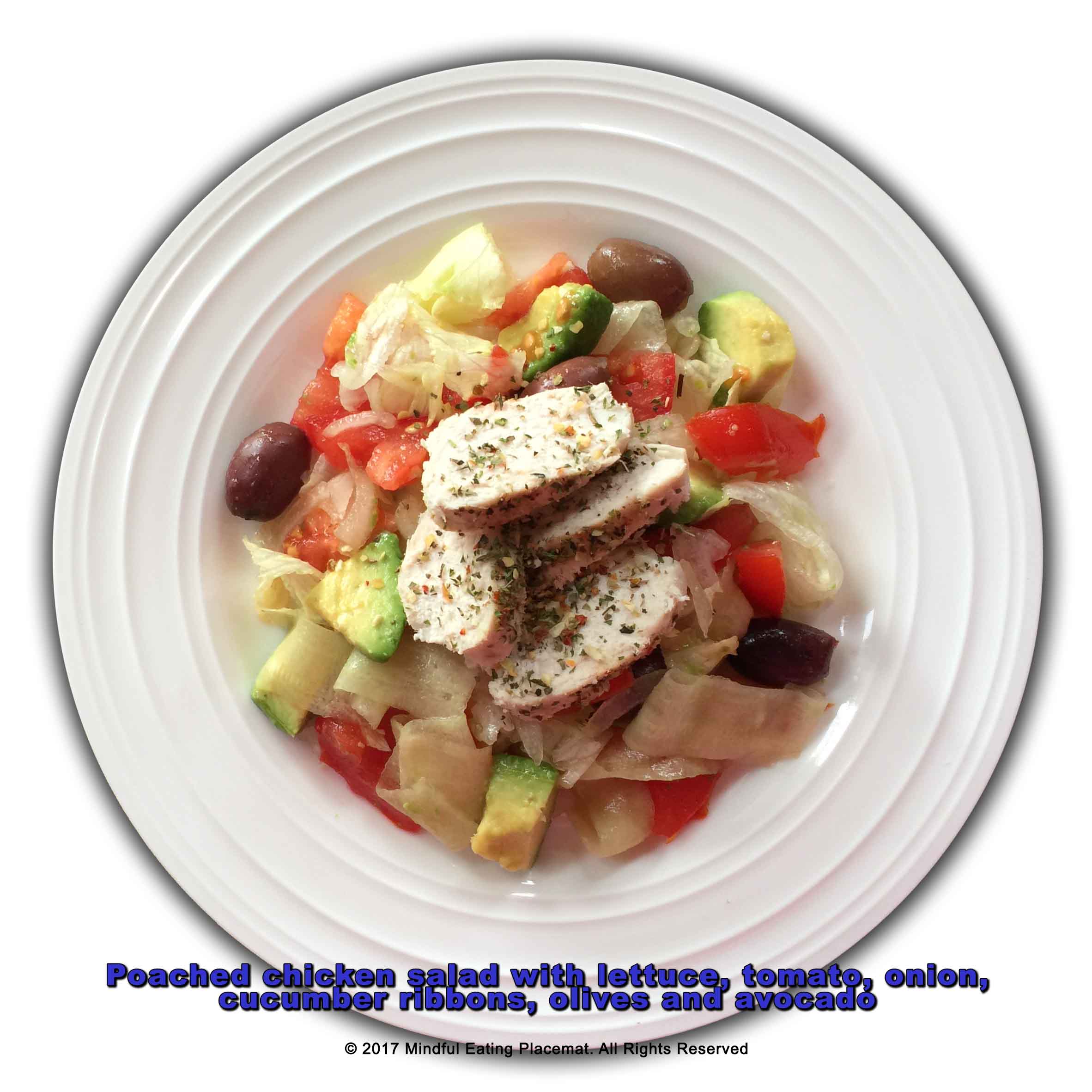 Poached chicken salad with lettuce, tomato, onion, cucumber ribbons olives and avocado