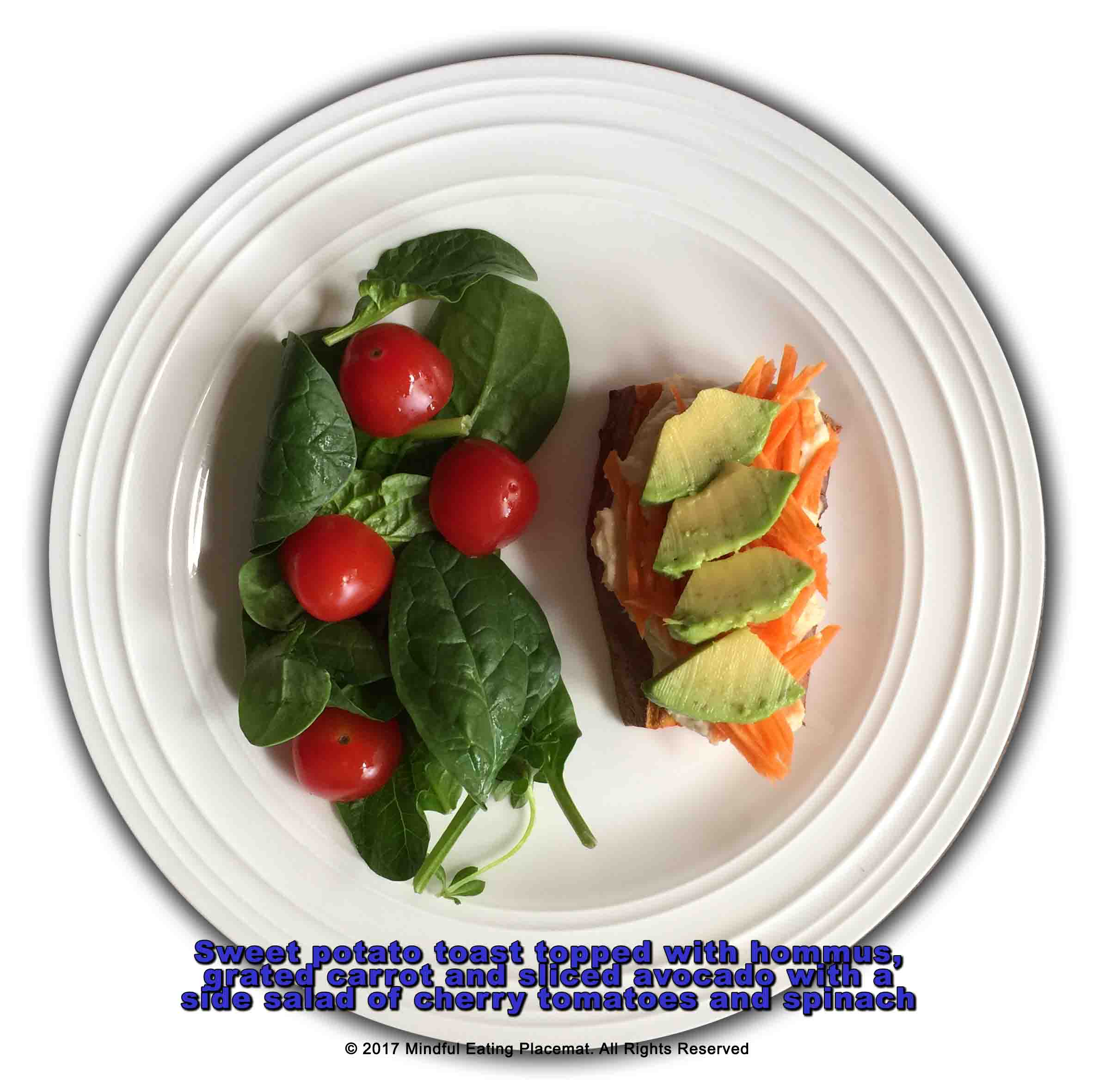 Sweet potato toast topped with hommus, carrot and avocado with a side salad of spinach and cherry tomatoes 