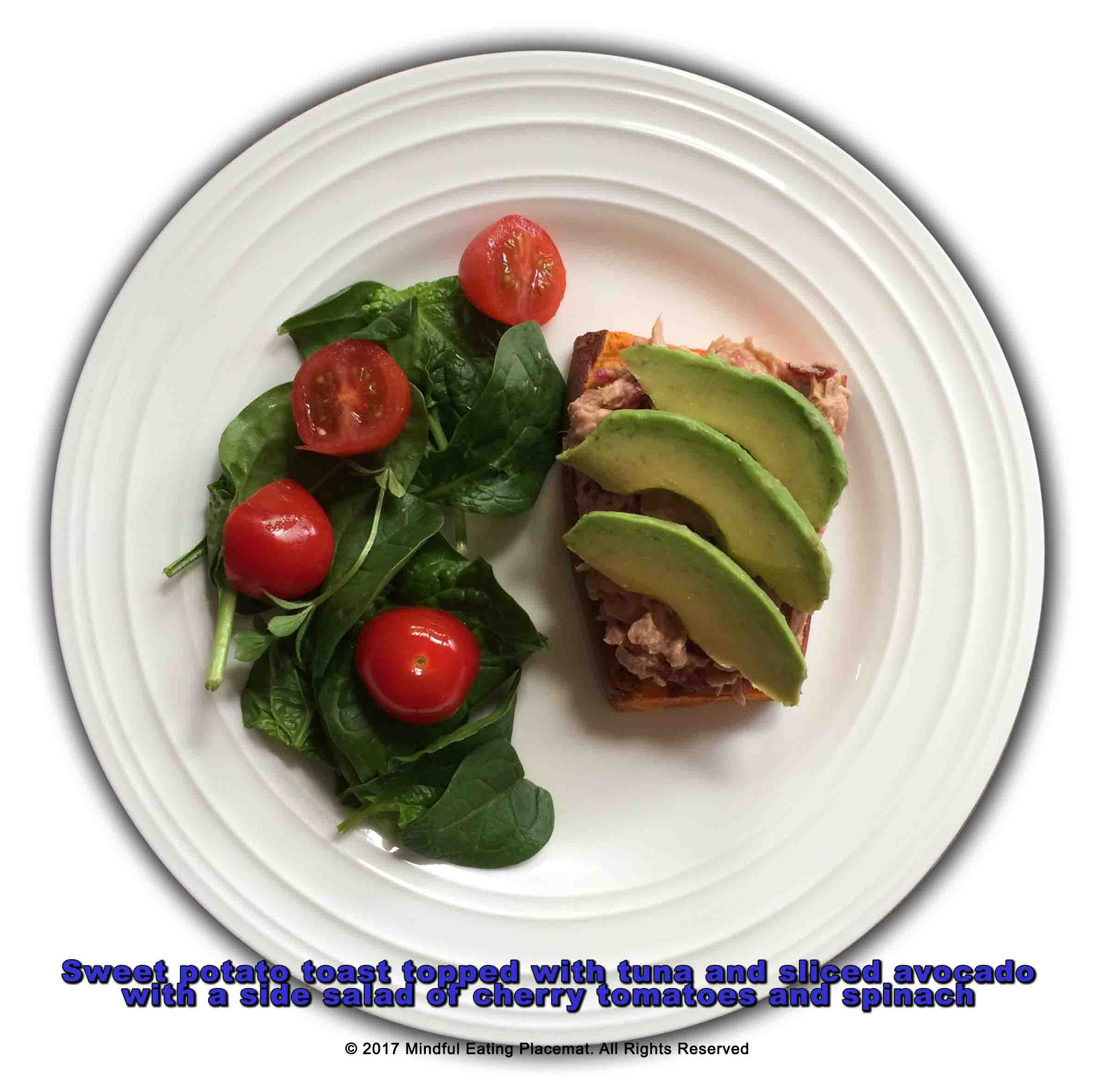 Sweet potato toast with tuna and avocado with a salad of spinach and cherry tomatoes 